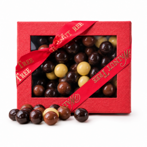 Milk, white and dark chocolate covered hazelnuts in a Walnut Tree gift box