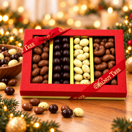 Walnut Tree luxury four-compartment chocolate-coated nut gift box featuring assorted milk, dark and white chocolate-coated nuts, presented in red packaging with gold ribbon against a warm festive Christmas background.