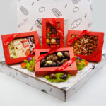 Luxury food hamper UK with nougat, chocolate Brazil nuts, marzipan fruits, and nut brittle bars